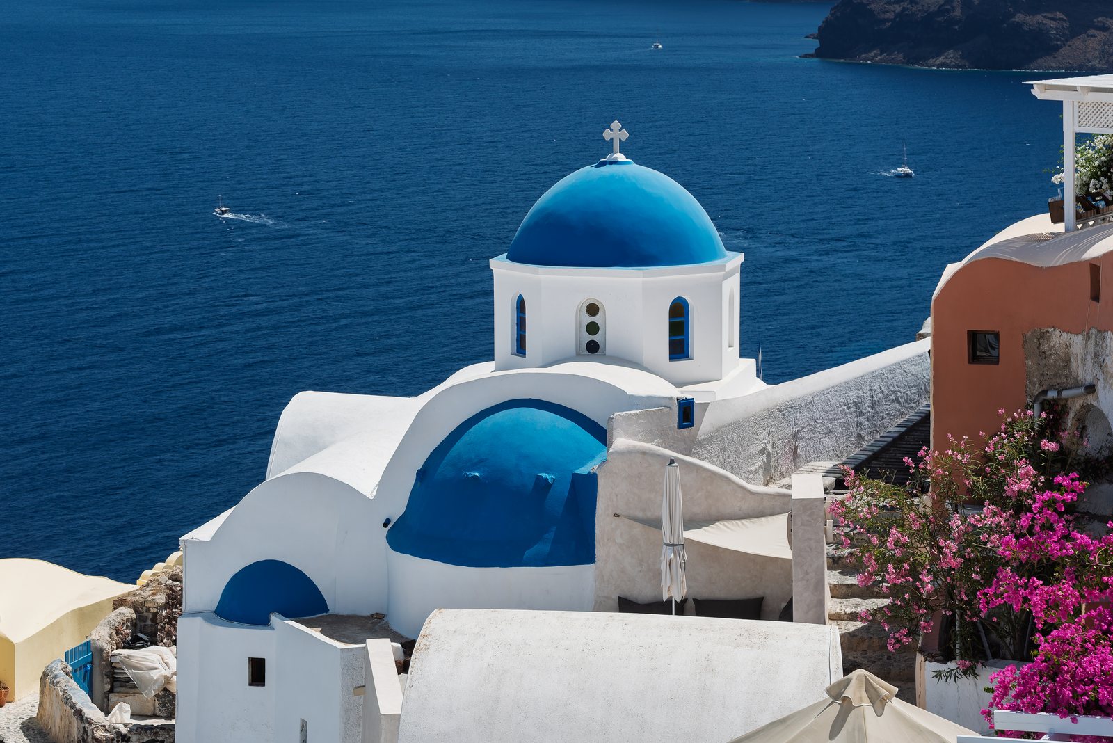 Blue-domed church in Oia, Santorini, Greece